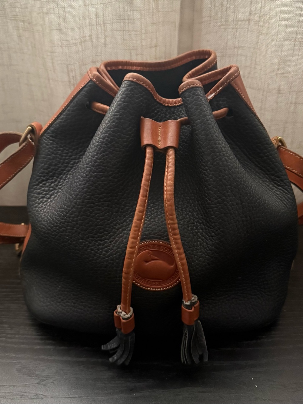 VTG Dooney & Bourke Black and Tan Leather Drawstring Bucket Bag